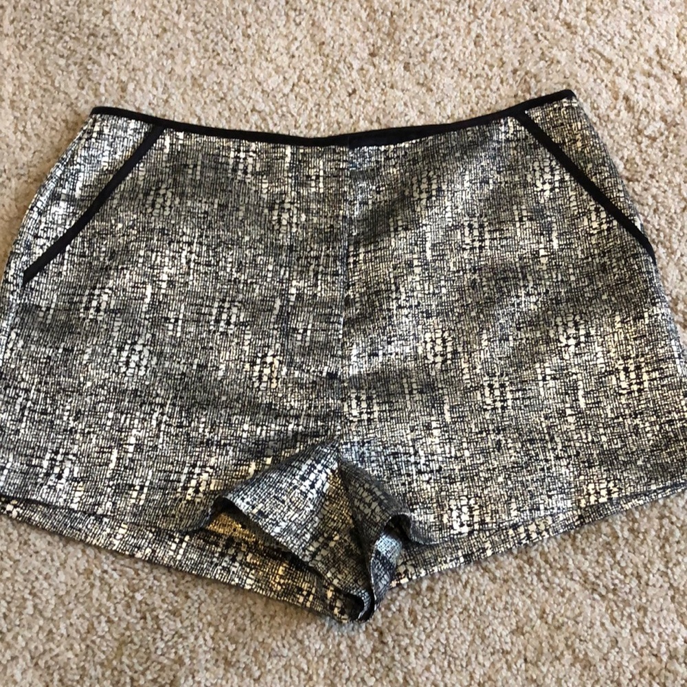 Forever21 black and gold short shorts. Size 6.